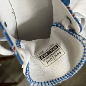 Row One Cubs canvas tennis shoes.